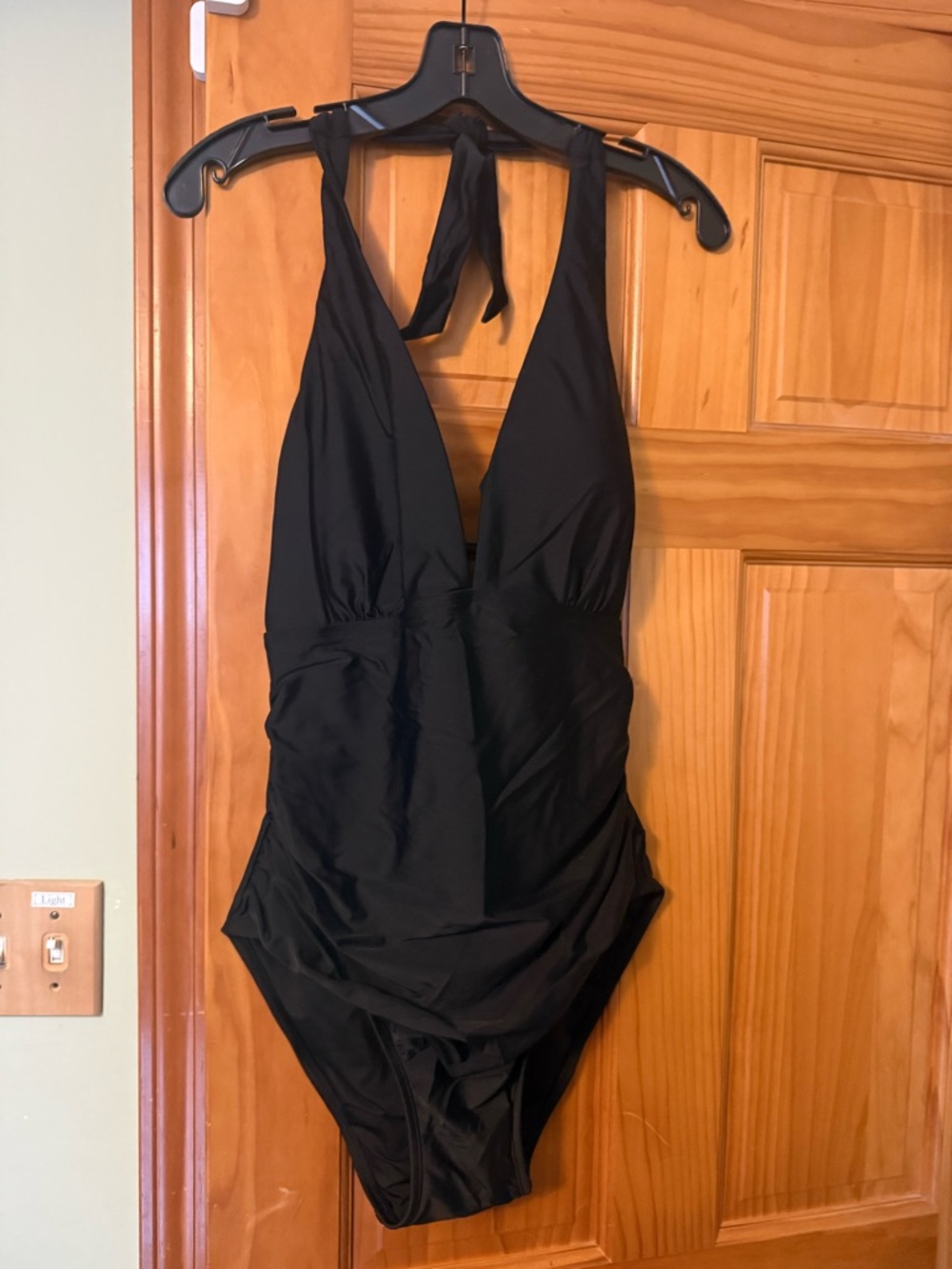 Black Halter One-Piece Swimsuit by DKNY with tummy control